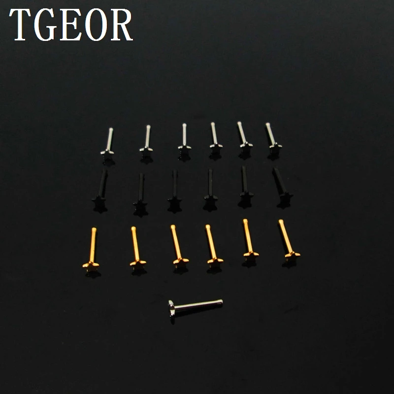 

Free shipping Hot wholesale 20G 100pcs titanium plated star pattern laser cut nose stud Stainless Steel piercing nose ring