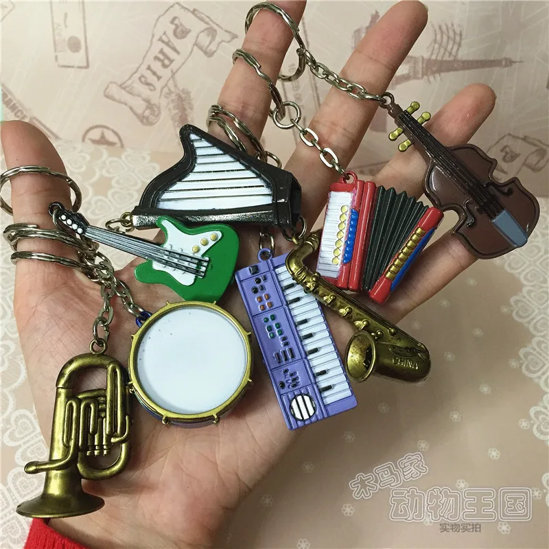 

pvc figure model toyMini instrument horn guitar saxophone round drum electronic piano accordion doll accessories 8pcs/set