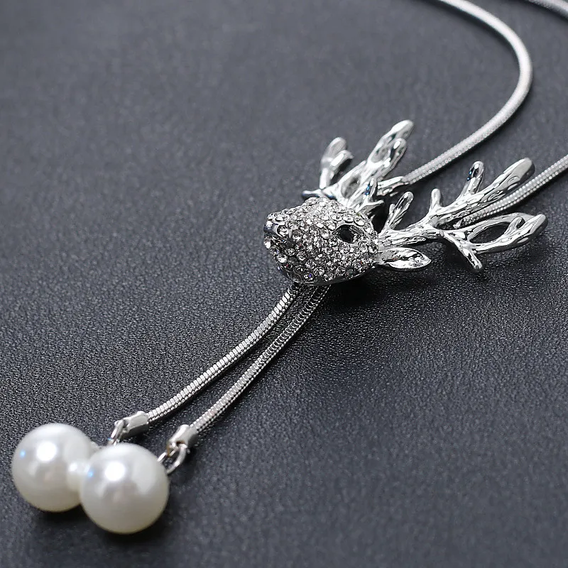 

Deer Elk Pendant Christmas Sweater Necklace Chain Women Cute Pendant Necklace Long Rhinestone Necklace Imitation Pearl Jewelry