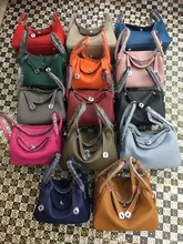 The new h Lin di female bag litchi grain cowhide portable Europe and the United States of big shop sign dumplings bag leather o new cowhide shoulder bag leather messenger bag buckle fashion europe and the united states portable ladies bag