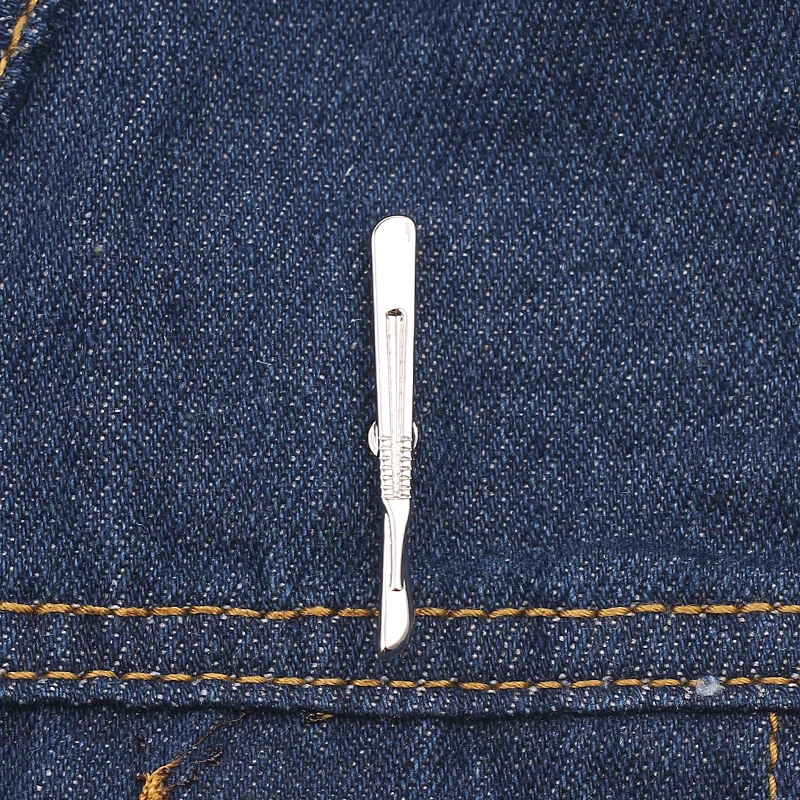 

Wholesale 20pcs Unique Tiny Scalpel Lapel Pins Surgical Knife Brooch for Doctors Nurse Anatomy Tools Medical Students Gifts