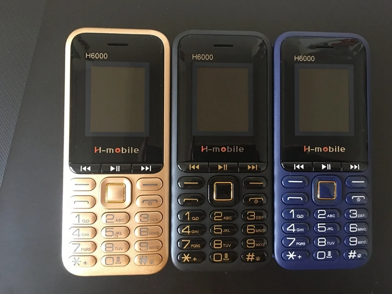 H6000 المحمول زر الهاتف قوية 4 سيم بطاقة بلوتوث MP3 راديو كبار الخلوية ميزة لوحة المفاتيح رخيصة 1.8 بوصة الهاتف المحمول H6000 المحمول زر الهاتف قوية 4 سيم بطاقة بلوتوث MP3 راديو كبار الخلوية ميزة لوحة المفاتيح رخيصة 1.8 بوصة الهاتف المحمول
