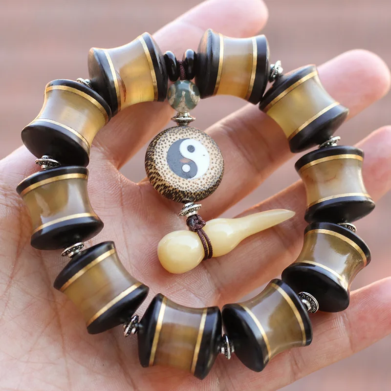 

Taiji Yin Yang Natural goat horn Bracelet inlaid with black cow horn original matching Bead selling goat horn Bracelet