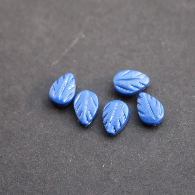 

(20 pieces/lot) 8.65mm*6mm*3mm Carved Artificial Coral leaf Cobalt blue color for Jewelry making