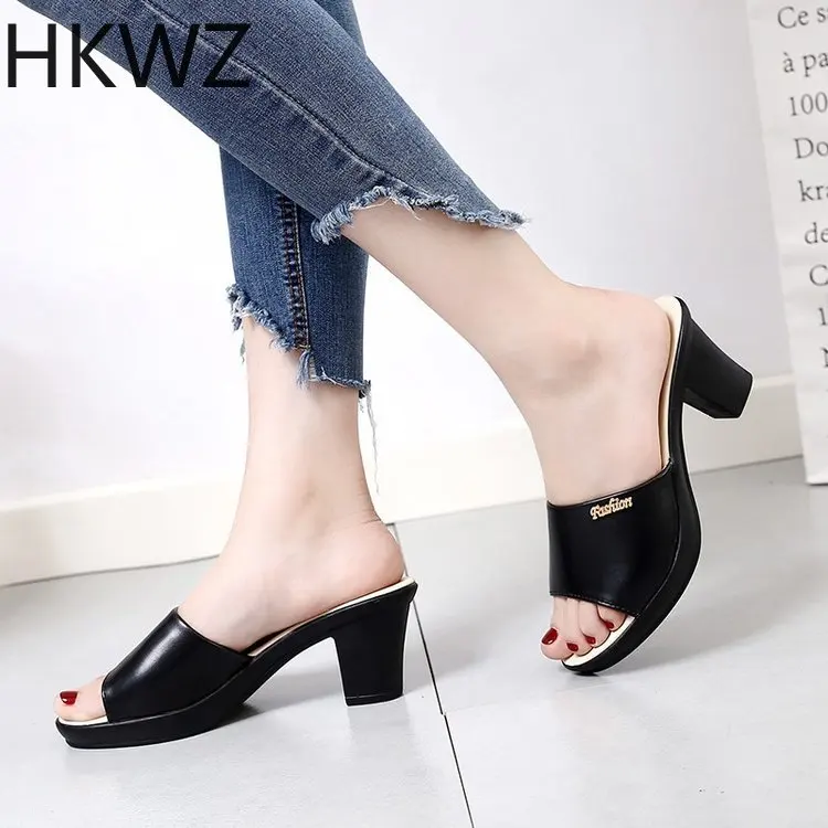 

High-heeled sandals women's new out wearing fashion thick with a wild one-word slippers thick with fish mouth slip sexy sandals