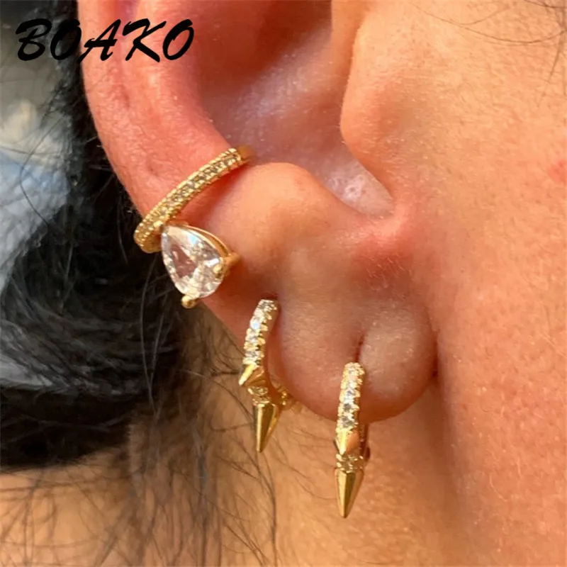 

BOAKO Fashion Punk Rivet Ear Studs Real 925 Sterling Silver Earrings for Women Spike Hoop Circle Huggie Piercing Earrings Studs