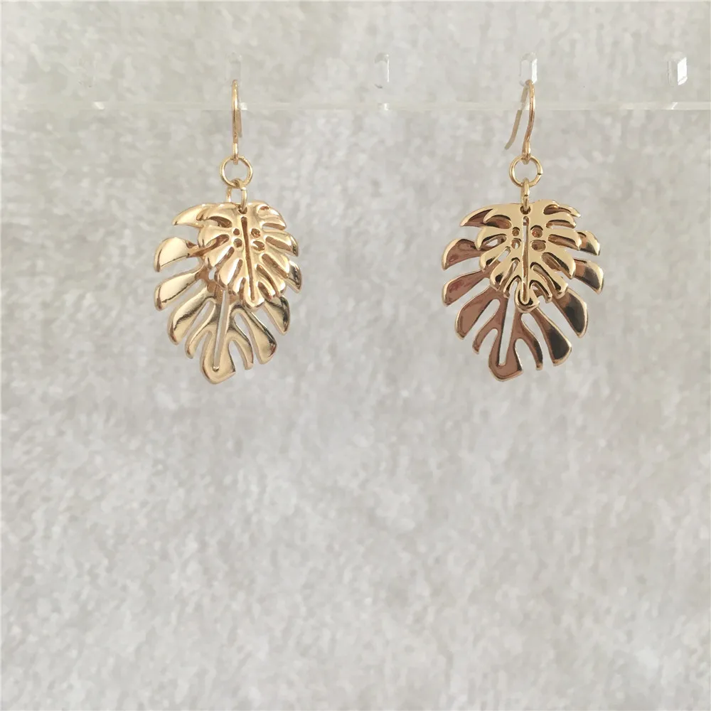 

Trendy gold color palm tree leaf pendant fish earring for woman girl