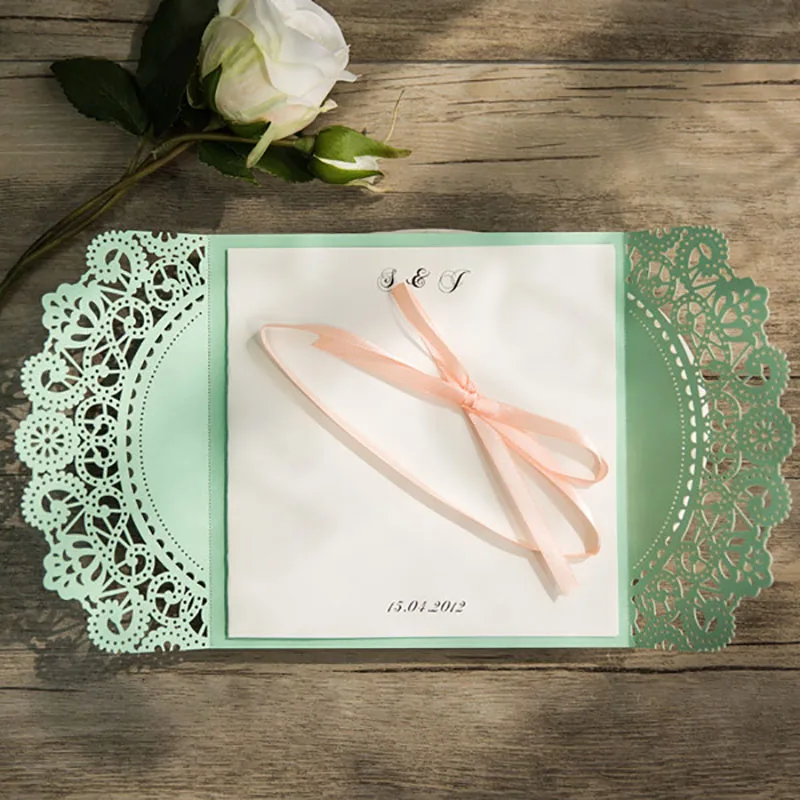 affordable-mint-and-peach-ribbon-laser-cut-wedding-invites-3