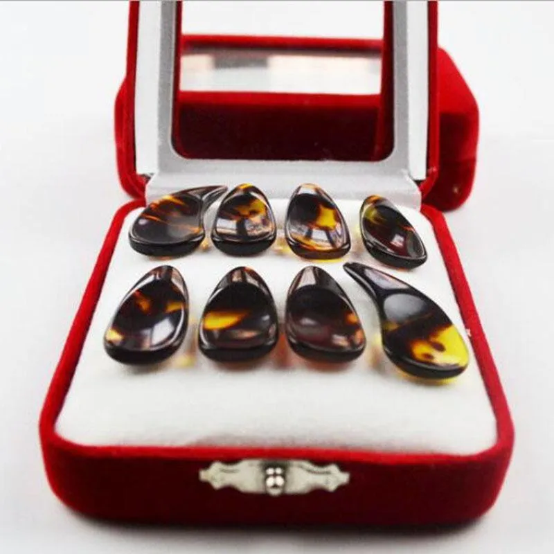 

New 8PCS/Set Gu Zheng Finger Picks Imitation natural Plastic Nail Withe Tape Instrument