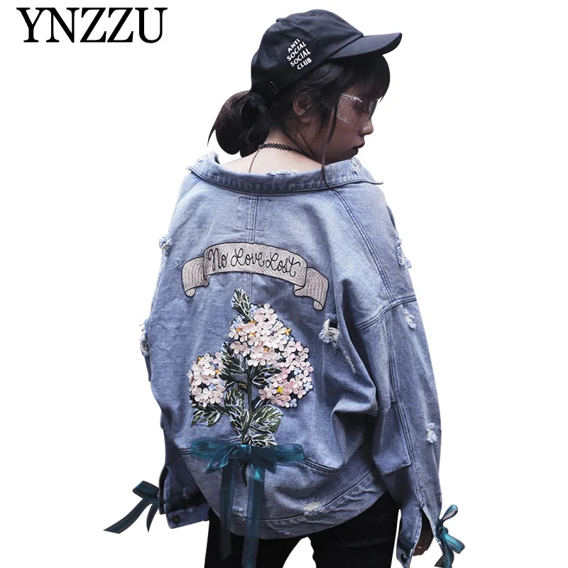 

YNZZU 2019 New arrival floral embroidery denim jacket Lace up oversize causal jeans coat Turn down collar Autumn outwear YO808