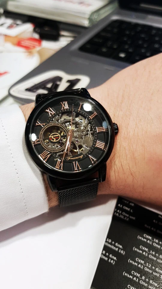 Montre squelette, bracelet maille