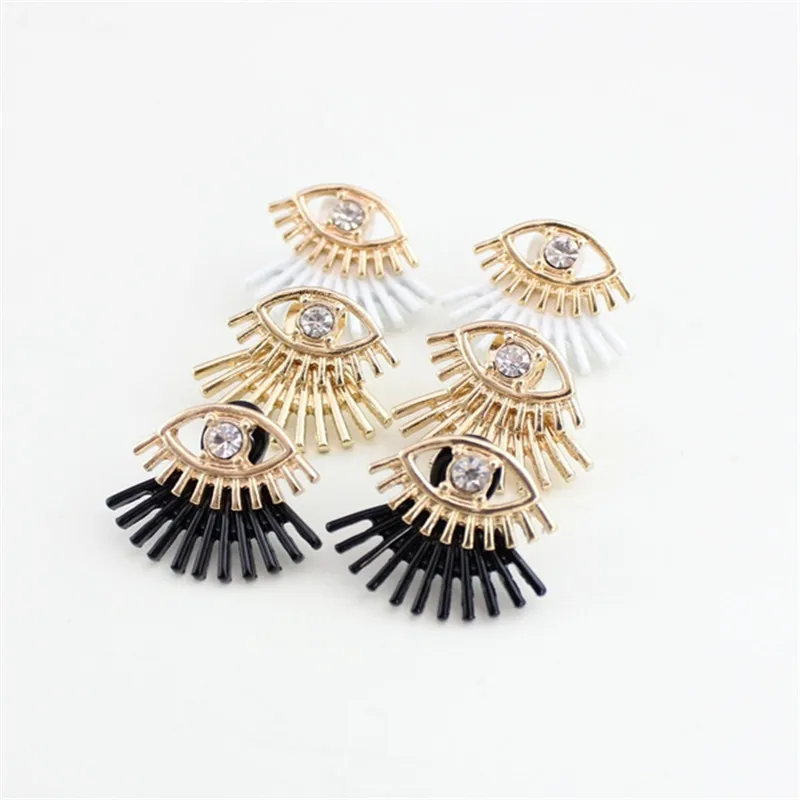 

XQ 2015 free shipping "Eye gems stud earrings Painted black and white stud earrings The new popular banquet texture