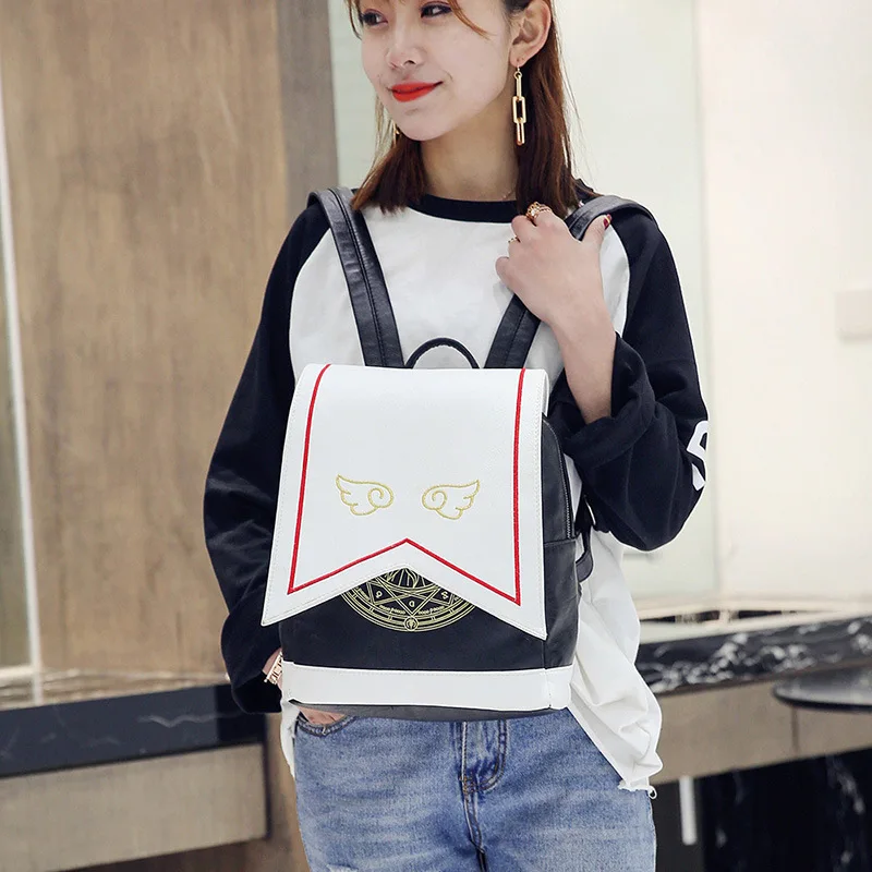 

Anime Card Captor SAKURA Kawaii Mini Backpack PU Women Backpack With Angel Wings Cardcaptor Sakura Printing School Bags Sac S422