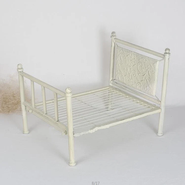 newborn photography iron bed