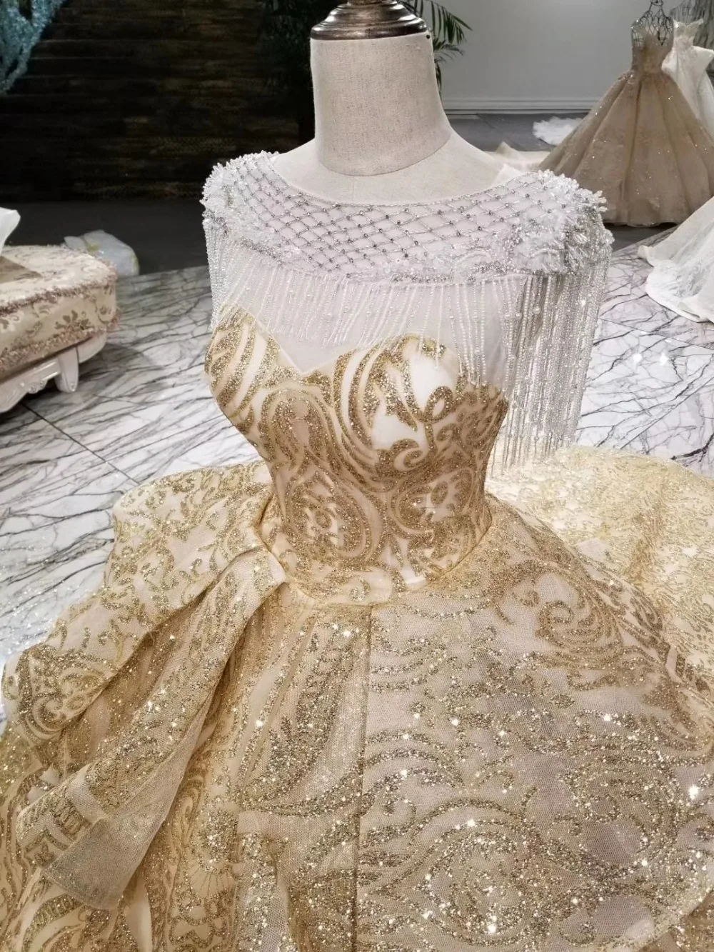 white and gold bridal dress