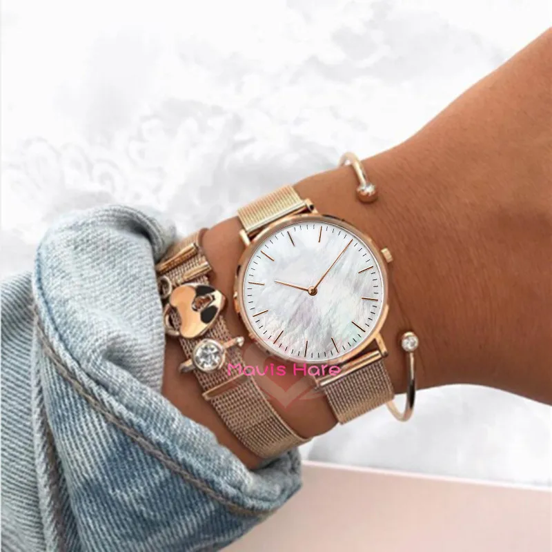 

Mavis Hare Rose Gold color White seashell dial Wrist Watch with lock & key Mesh Charm Bracelet Set & Clear Crystal Cuff Bangle