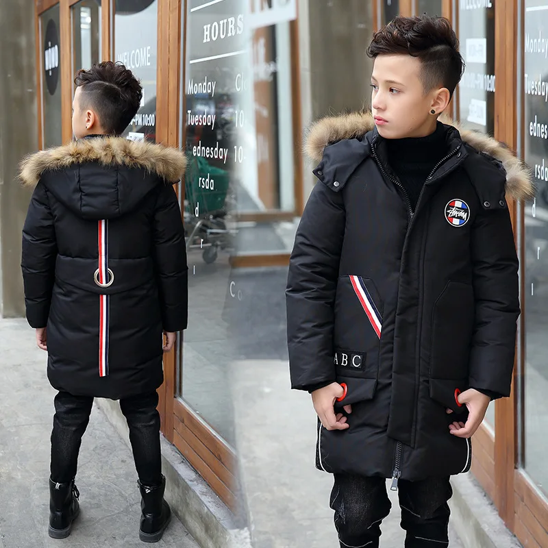 

Handsome and well-behaved UV protection with fluorescent coating in the big boy winter down jacket long thick children's jackets