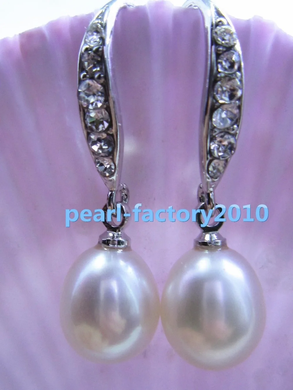 

Selling >fashion 9-10MM AAA south sea white pearl earrings Fine Silver