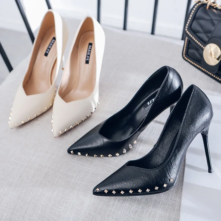 

2019 spring new fashion simple solid color high heel women comfortable wild metal rivet decorative pointed high heels.
