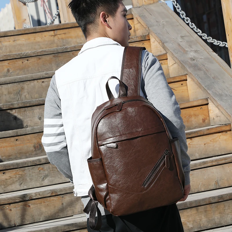 

Backpack student bag men fashion trend Korean youth simple travel PU leather backpack