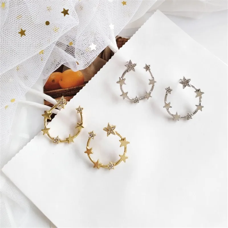 

New wild simple C-shaped shape sparkling five-pointed star earrings Japanese and Korean personality earrings
