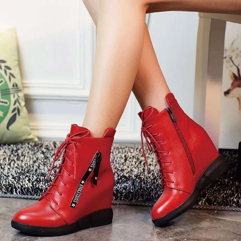 

2018 autumn and winter new top layer cowhide casual wild plus velvet wedge with women's booties.