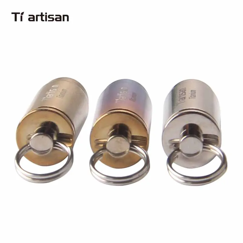 Ti artesano al aire libre Camping accesorios portátil de titanio bala colgante Caja impermeable con llavero y collar Ta6016Ti