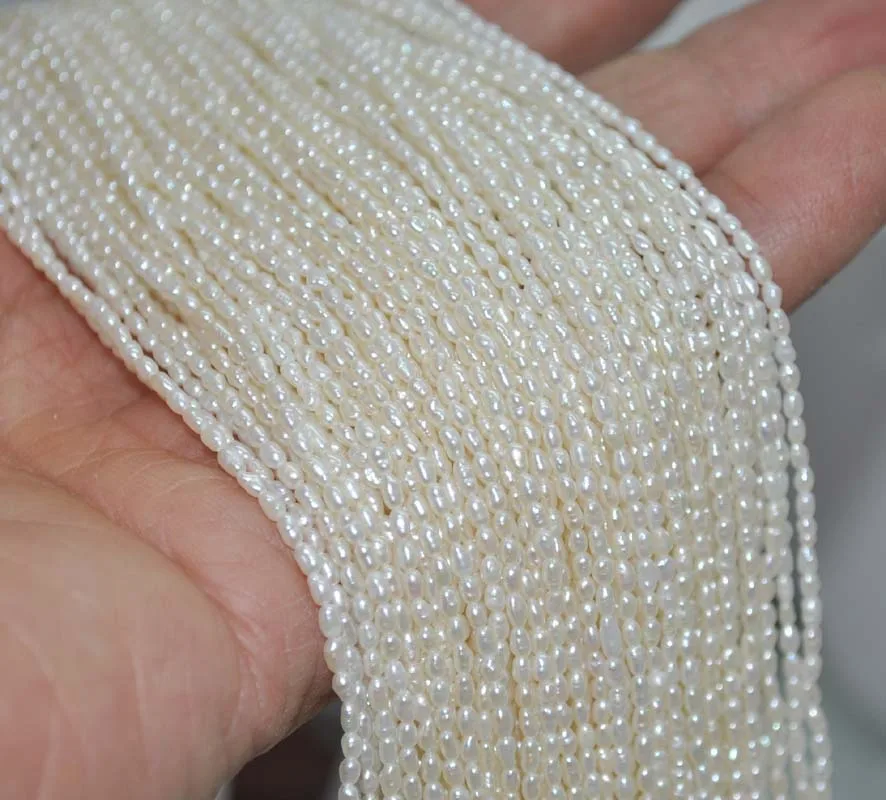 

Natural white 10strs AA 2*3mm luster rice freshwater pearl
