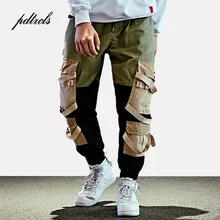 Брюки-карго в стиле хип-хоп; уличная одежда; мужские мешковатые шаровары; Лоскутные Брюки с карманами; повседневные брюки с лентами Харадзюку