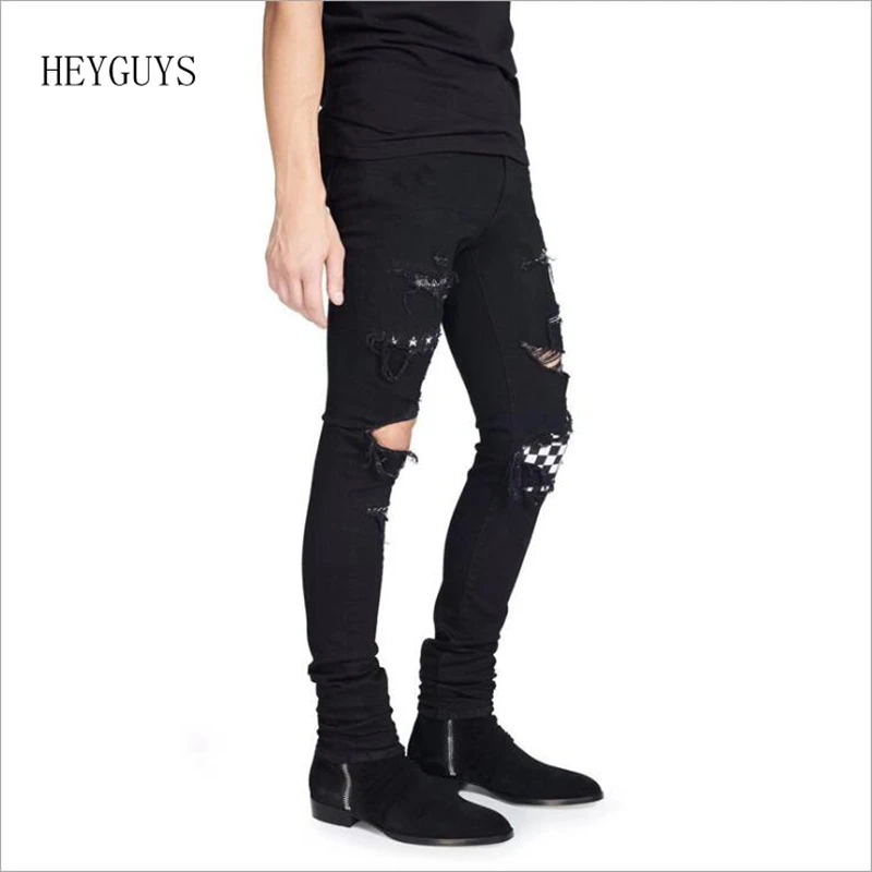 ripped jeans with black patches