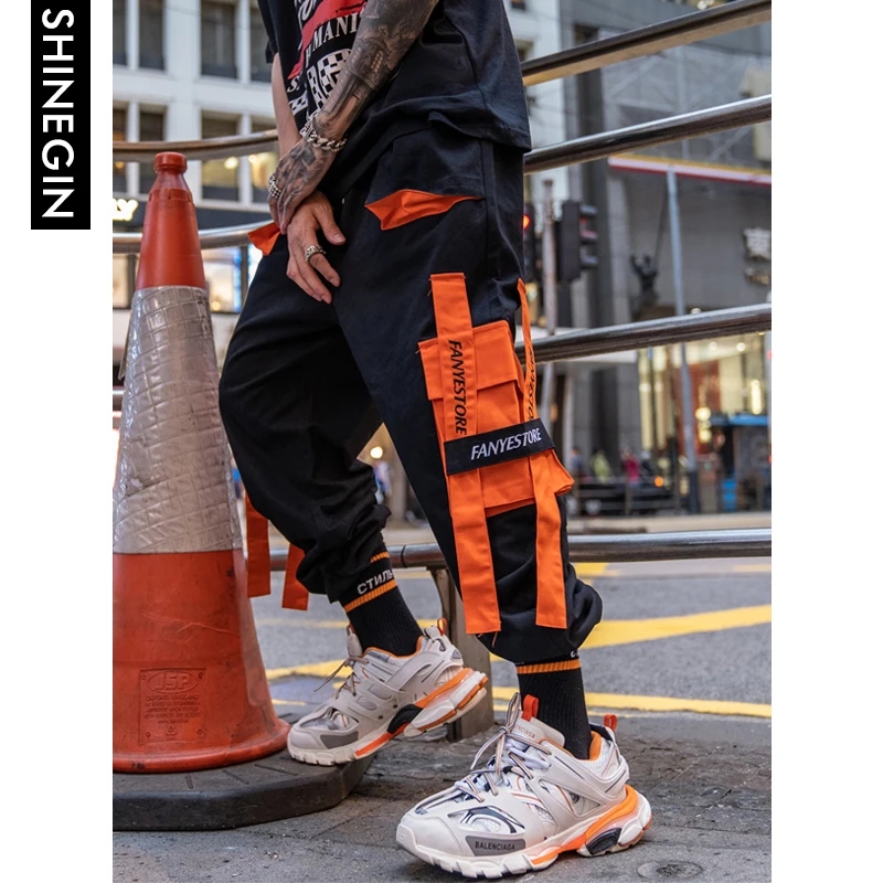 SHINEGIN Orange Multi pocket Cargo Pants Streetwear Tactical Pants Harem Pants Men Sweatpants Mens Casual Harem Joggers 262W SHINEGIN Orange Multi pocket Cargo Pants Streetwear Tactical Pants Harem Pants Men Sweatpants Mens Casual Harem Joggers 262W