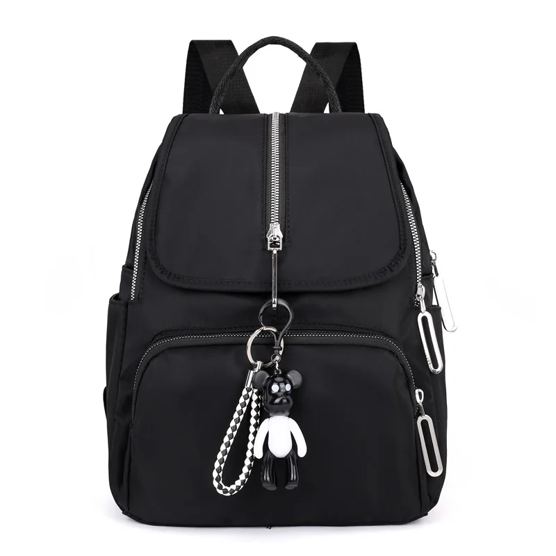 Bolsa de Escola Leve Náilon Mochila Impermeável Respirável Tecido Marca Estudantes Moda Cor Sólida Urso Pingente