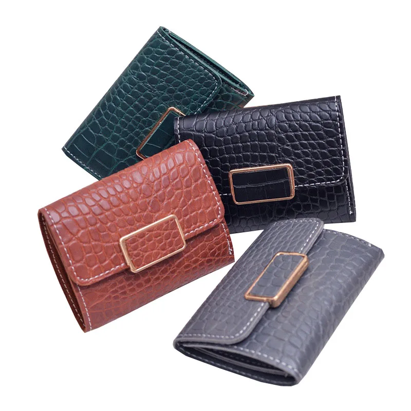 

Snake pattern short ladies clutch bag 2018 new small wallet Korean version of the simple wallet tri-fold buckle clutch bag