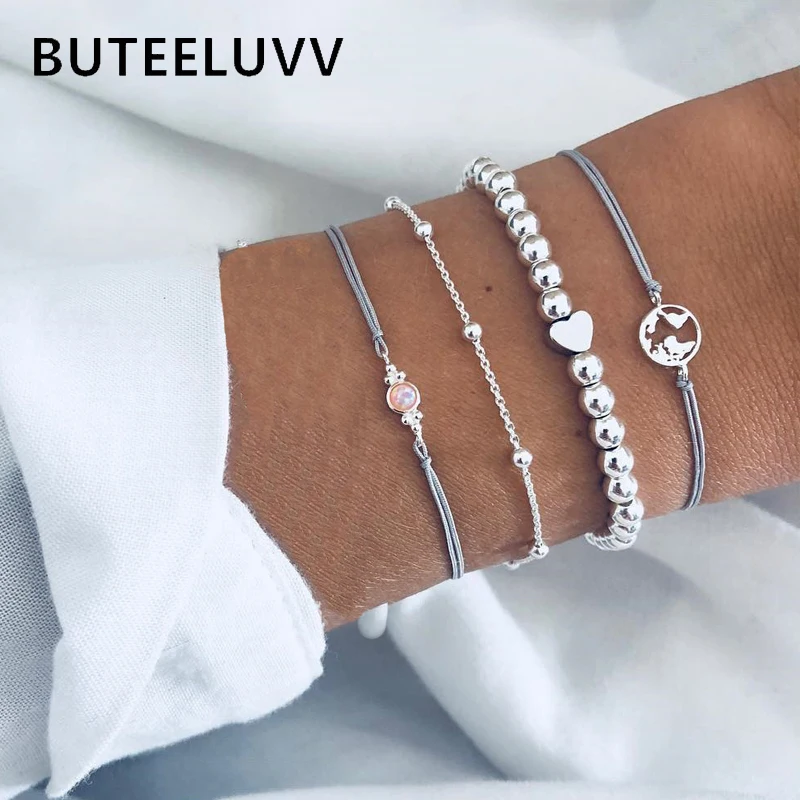 

BUTEELUVV 4 pcs/set Silver Beaded Chain Bracelets for Women Bohemian Handmade Gray Rope Weave Heart World Map Charm Bracelets