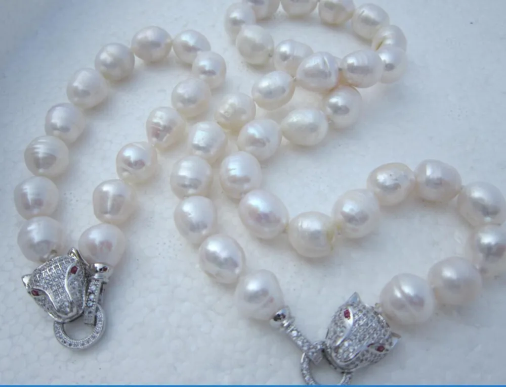 

Free Shipping >>>>>AAA 11-13MM SOUTH SEA BAROQUE WHITE PEARL BRACELET NECKLACE SET Leopard Clasp