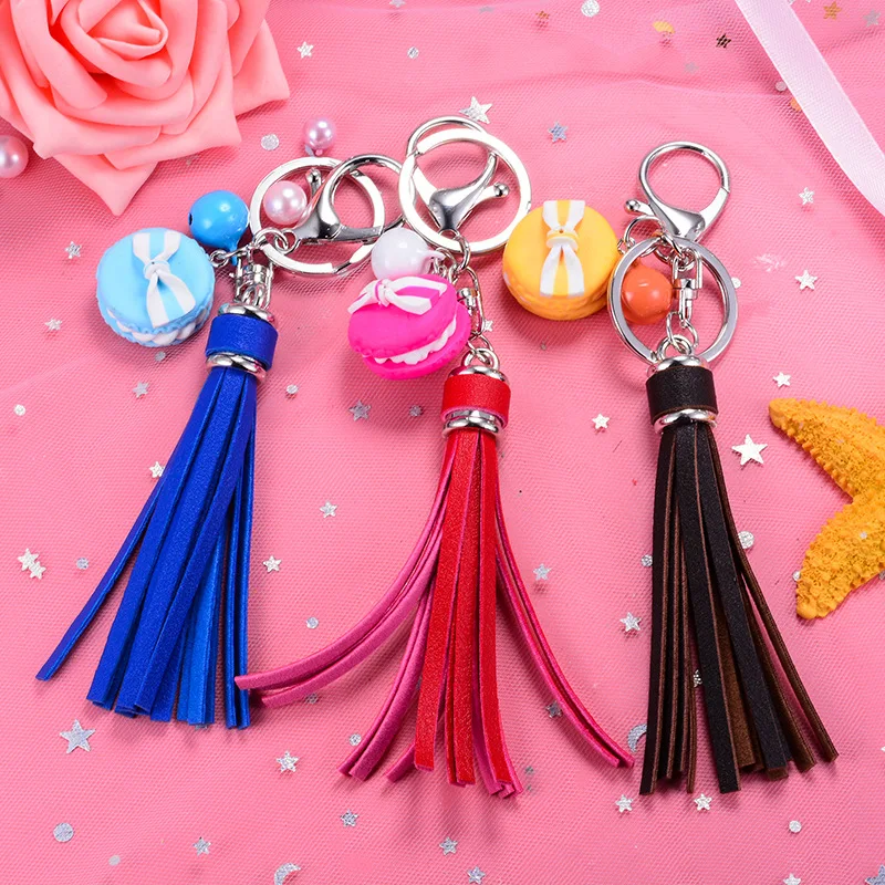 

Hot Sale New Leather Tassel Keychain Soft Ceramic Bell Hanging DIY Bag Pendant Car Small Gift Trinkets Porte Clef