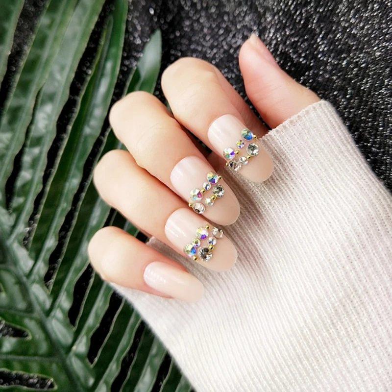 

2019 long oval head fake nail size is not uniform round diamond inlay nail khaki black white pure background color