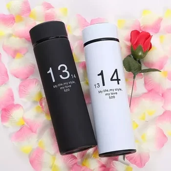 

A pair of stainless steel thermos cups