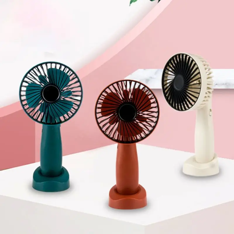

Mini Portable USB Charging Fan Rotating Handheld Desktop Cooling Fan Cooler Mobile Phone Holder Supplies