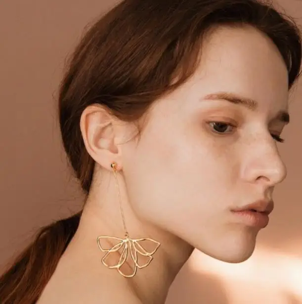 

New Fashion Petal earrings female fashion simple personality long ins wind flower Earrings