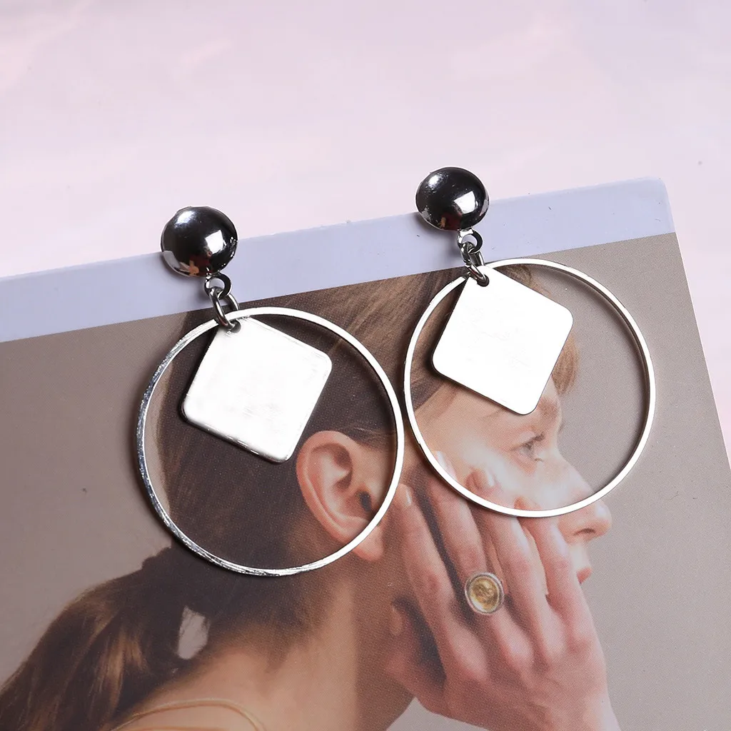 

European and American Retro Metal Round Hollow Earrings Female Simple Geometric Round Earrings wild Fashion Long Earrings
