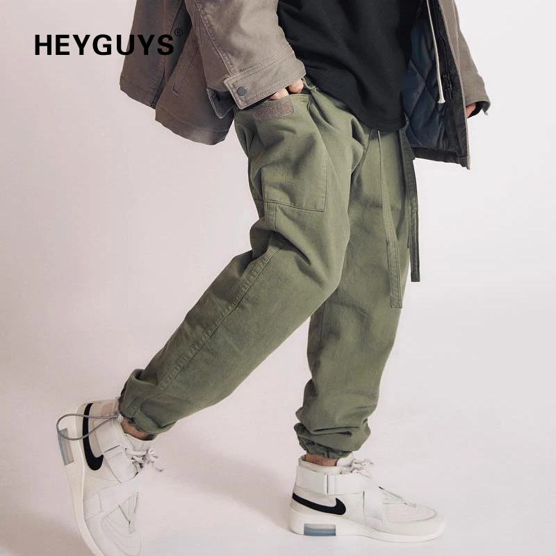

HEYGUYS fashion Long Pants Men Casual Sweatpants Jogger Trousers Fashion Fitted Bottoms street wear hip hop Button design