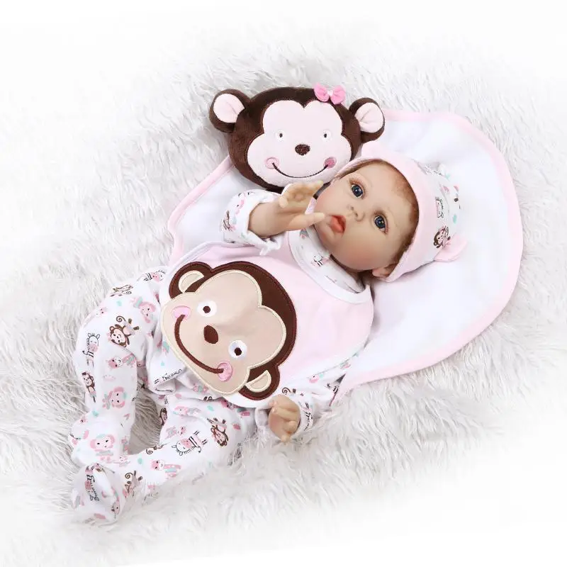 

The New Listing 22 inch Soft Body Silicone Reborn Baby Girl Dolls in Pink Monkey Clothes Lovely Blue Eyes Brinquedos Menina
