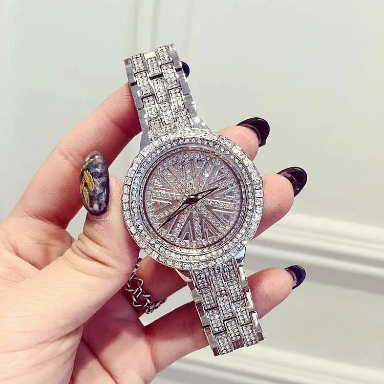 2017 New Women Stainless Steel Watch Lady Shining Rotation Dress Watch Big Diamond Stone Wristwatch Lady Silver Rose Gold Watch