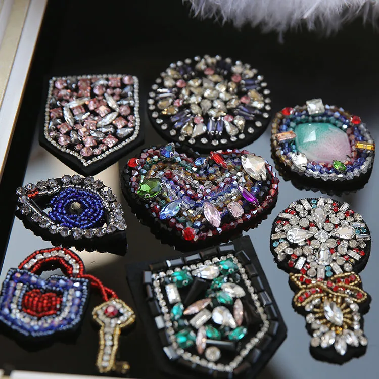

sequined beaded heart shoulder patches for jackets,rhinestone beads eye appliqued for jeans,crystals patches for clothing A932