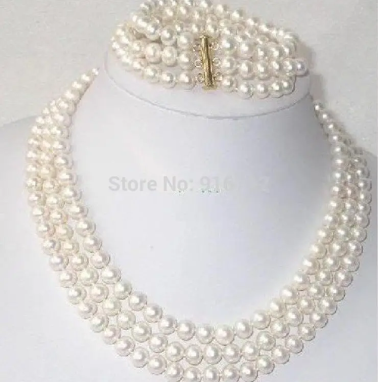 

Wholesale >>>>>set triple strands 8-9 mm south sea white pearl necklace bracelet