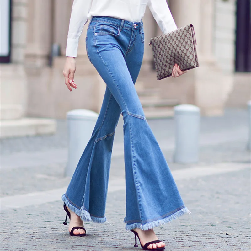 Бесплатная доставка 2018 стрейч модные длинные джинсы брюки для женщин расклешенные брюки плюс размер 25-30 джинсовые летние кисточкой джинсы