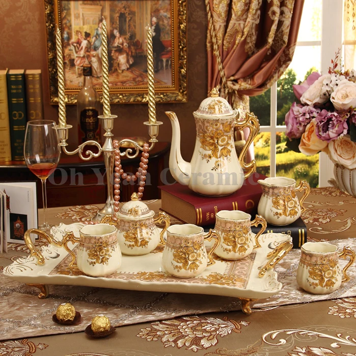 

Porcelain coffee cup set ivory porcelain flower design outline in gold 8pcs coffee set coffee pot coffee jug saucer set tea tray