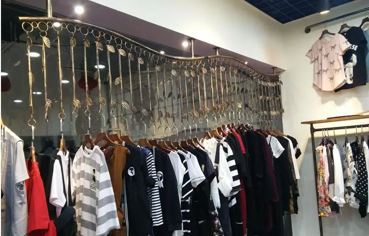 Clothing store display stand. On the wall side rack. Retro combination racks. Hanging.009