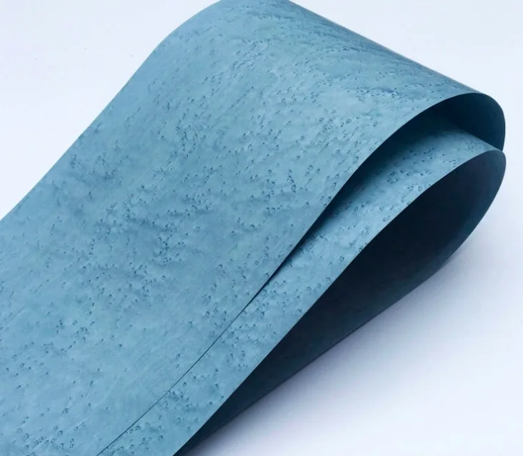 

Length:2.5meters Width:20cm Thickness:0.25mm High-grade Lakewater Blue Fine Finch Eye Bark Wood Veneer